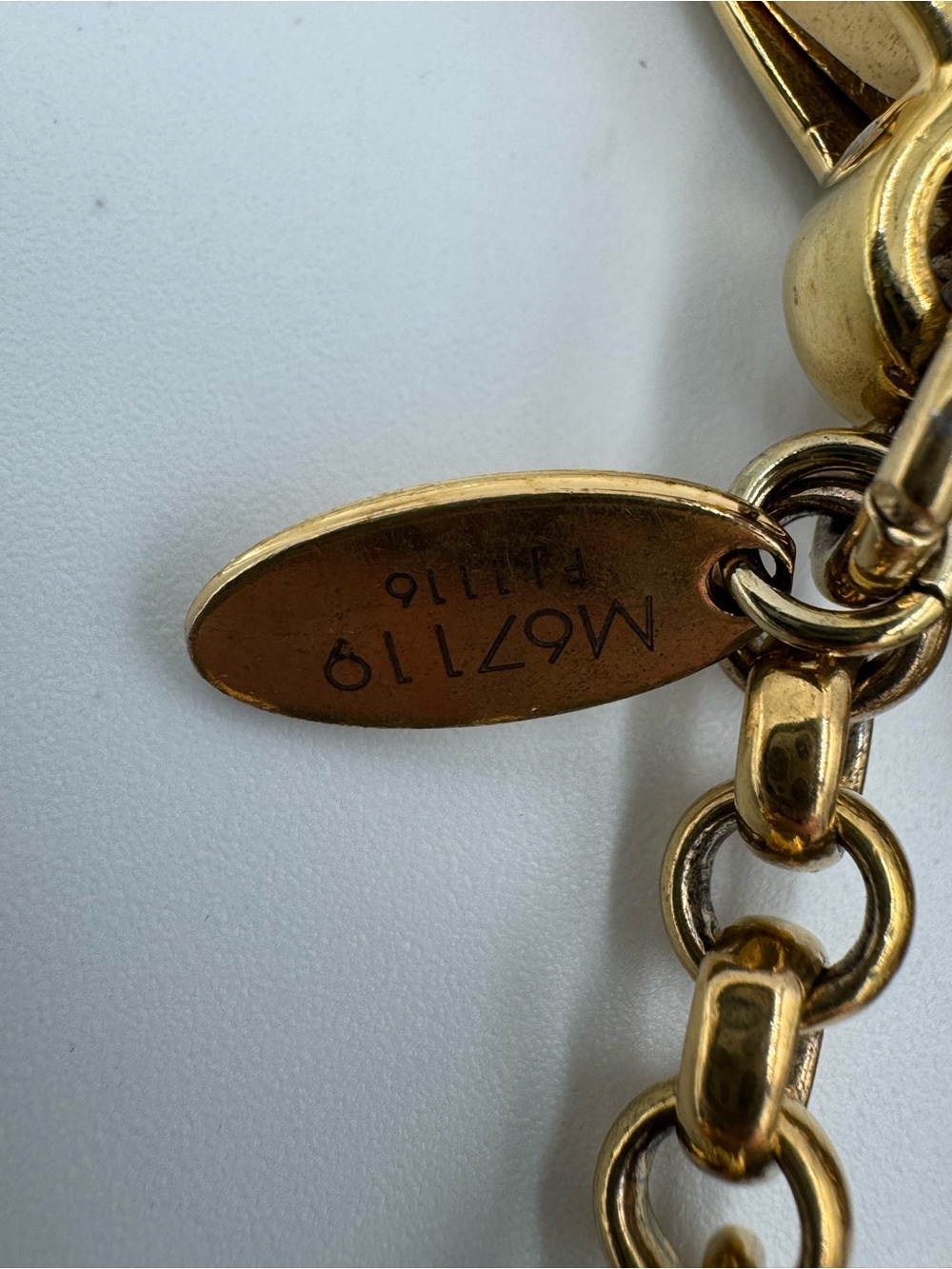 Louis Vuitton Fleur De Bag Charm in Gold Tone with Blush, Purple, and Black - Picture 3 of 8